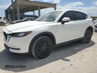 2018 Mazda CX-5 Sport with VIN JM3KFBBM2J0330444, listed as a Copart auction lot 53057675 with 121,747 mi miles and Clean Title. Bid and sale history available at carsss.com. Image 1.