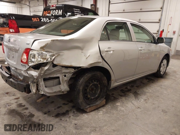 2009 Toyota Corolla with VIN 1NXBU40E69Z129314, listed as a IAAI auction lot 41718098 with 170,739 mi miles. Bid and sale history available at carsss.com. Image 4.