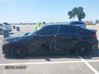 2023 Honda Civic Sport with VIN 19XFL2H84PE001354, listed as a IAAI auction lot 42053691 with 34,127 mi miles and . Bid and sale history available at DreamBid. Image 14.