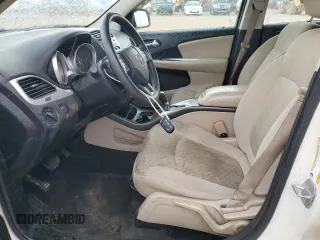 2013 Dodge Journey American Value with VIN 3C4PDCAB5DT656997, listed as a Copart auction lot 57123565 with 201,799 mi miles and Salvage title. Bid and sale history available at DreamBid. Image 7.