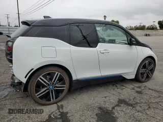 2019 BMW i3 with VIN WBY8P4C54K7D09611, listed as a Copart auction lot 48233235 with 59,853 mi miles and Salvage Title. Bid and sale history available at carsss.com. Image 3.