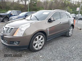 2014 Cadillac SRX Performance Collection with VIN 3GYFNCE33ES570472, listed as a IAAI auction lot 41971511 with 200,811 mi miles. Bid and sale history available at carsss.com. Image 2.