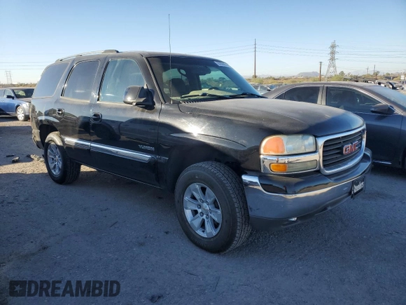 2004 GMC Yukon SLE with VIN 1GKEC13VX4R279540, listed as a Copart auction lot 82689874 with 250,179 mi miles and Salvage Title. Bid and sale history available at carsss.com. Image 4.