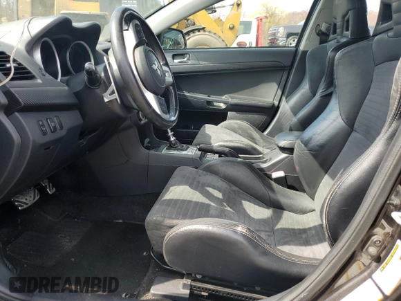 2008 Mitsubishi Lancer Evolution MR z VIN JA3AW56V18U051769, wystawiony jako Copart lot #50887745 z przebiegiem 138 980 mil mil oraz Czysty tytuł • Clean title. Historia ofert i sprzedaży dostępna na DreamBid. Obrazek 7.