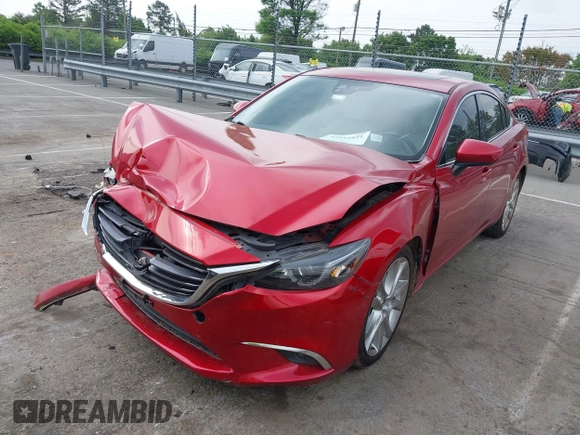 2016 Mazda 6 i Grand Touring with VIN JM1GJ1W57G1460281, listed as a IAAI auction lot 42016051 with 89,784 mi miles. Bid and sale history available at carsss.com. Image 2.