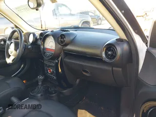 2014 MINI Countryman S z VIN WMWZC5C57EWP38396, wystawiony jako IAAI lot #41027727 z przebiegiem 147 260 mil mil oraz . Historia ofert i sprzedaży dostępna na DreamBid. Obrazek 5.