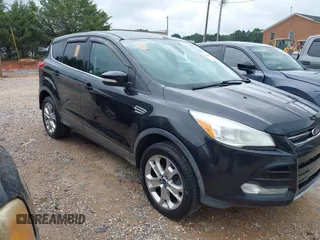 2013 Ford Escape SEL with VIN 1FMCU9H97DUA80867, listed as a IAAI auction lot 42709994 with Not provided miles and . Bid and sale history available at DreamBid. Image 1.