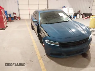 2021 Dodge Charger SXT with VIN 2C3CDXBG8MH522255, listed as a IAAI auction lot 41587621 with 136,063 mi miles. Bid and sale history available at carsss.com. Image 1.