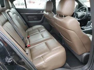 2016 Lincoln MKS z VIN 1LNHL9DK5GG602626, wystawiony jako Copart lot #50748125 z przebiegiem 118 884 mil mil oraz Szkoda całkowita • Salvage title. Historia ofert i sprzedaży dostępna na DreamBid. Obrazek 10.