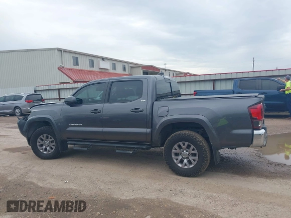 2018 Toyota Tacoma SR5 with VIN 5TFAZ5CN5JX062498, listed as a IAAI auction lot 41867393 with 128,879 mi miles and . Bid and sale history available at DreamBid. Image 15.
