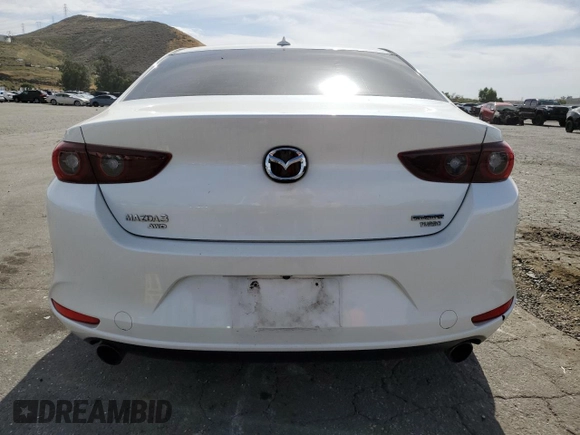 2022 Mazda 3 2.5 Turbo с VIN 3MZBPBAY9NM302022, выставлен на аукционе Copart как лот 56648605 с пробегом 51 785 миль миль и Списание • Salvage title. История ставок и продаж доступна на DreamBid. Изображение 6.