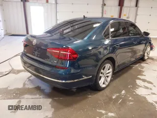 2019 Volkswagen Passat 2.0T Wolfsburg Edition with VIN 1VWLA7A30KC008917, listed as a IAAI auction lot 40791328 with 63,747 mi miles. Bid and sale history available at carsss.com. Image 4.