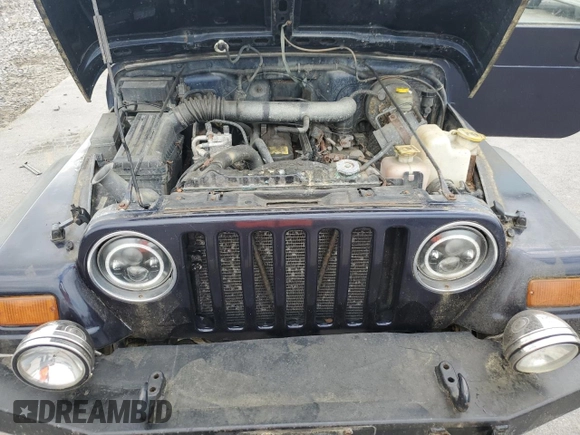 1997 Jeep Wrangler Sport with VIN 1J4FY19S2VP452229, listed as a Copart auction lot 60422775 with 164,346 mi miles and Clean title. Bid and sale history available at DreamBid. Image 12.