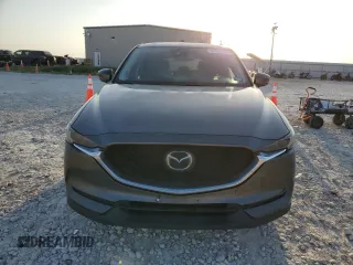 2017 Mazda CX-5 Grand Touring with VIN JM3KFBDL1H0148961, listed as a Copart auction lot 52648115 with 171,767 mi miles and Salvage Title. Bid and sale history available at carsss.com. Image 5.