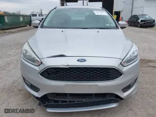 2015 Ford Focus SE with VIN 1FADP3F24FL297665, listed as a IAAI auction lot 41893672 with 105,719 mi miles. Bid and sale history available at carsss.com. Image 6.