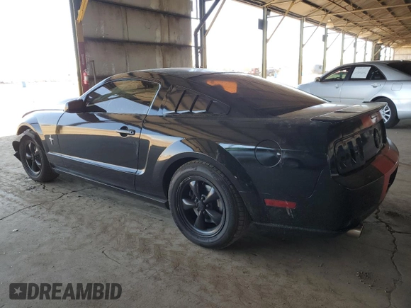 2008 Ford Mustang Deluxe with VIN 1ZVHT80N085150500, listed as a Copart auction lot 54087165 with 138,364 mi miles and Salvage Title. Bid and sale history available at carsss.com. Image 2.