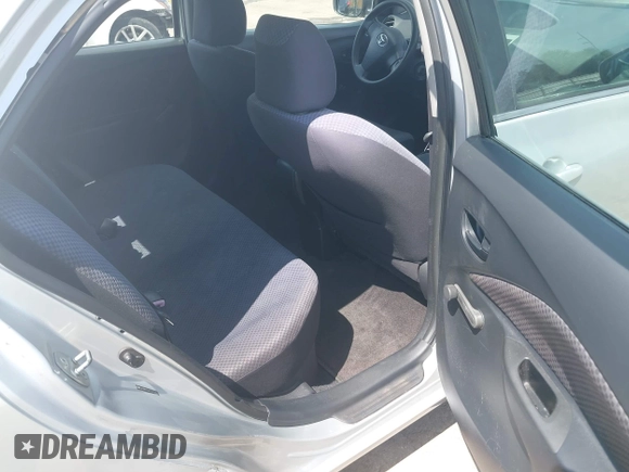 2007 Toyota Yaris with VIN JTDBT923871051021, listed as a IAAI auction lot 42126812 with 316,556 mi miles. Bid and sale history available at carsss.com. Image 8.