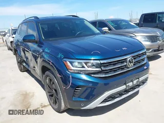 2022 Volkswagen Atlas SE z VIN 1V2WP2CA2NC527645, wystawiony jako IAAI lot #42243973 z przebiegiem 57 742 mil mil oraz . Historia ofert i sprzedaży dostępna na DreamBid. Obrazek 1.