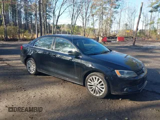 2012 Volkswagen Jetta Sedan SEL w/Sunroof with VIN 3VWLX7AJ2CM409673, listed as a IAAI auction lot 41860309 with 186,661 mi miles. Bid and sale history available at carsss.com. Image 1.
