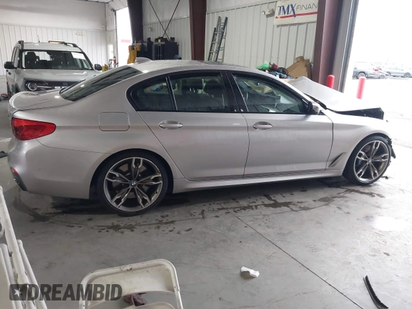 2020 BMW 5 Series M550i xDrive z VIN WBAJS7C07LCD85532, wystawiony jako IAAI lot #41518071 z przebiegiem 57 645 mil mil oraz . Historia ofert i sprzedaży dostępna na DreamBid. Obrazek 13.