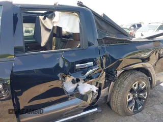 2021 Nissan Titan Pro-4X with VIN 1N6AA1ED4MN515673, listed as a IAAI auction lot 42028678 with 128,719 mi miles and . Bid and sale history available at DreamBid. Image 13.
