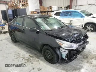 2023 Kia Rio LX with VIN 3KPA24AD0PE615673, listed as a Copart auction lot 70046634 with 55,906 mi miles and Salvage Title. Bid and sale history available at DreamBid. Image 11.