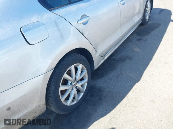 2015 Volkswagen Jetta Sedan 1.8T SE with VIN 3VWD17AJXFM324283, listed as a IAAI auction lot 41769785 with 103,686 mi miles. Bid and sale history available at carsss.com. Image 6.