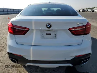 2018 BMW X6 xDrive35i with VIN 5UXKU2C52J0Z61957, listed as a Copart auction lot 73596543 with 87,119 mi miles. Bid and sale history available at carsss.com. Image 6.