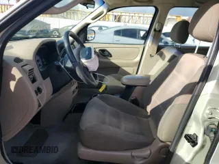 2004 Ford Escape XLS with VIN 1FMYU021X4KA41111, listed as a Copart auction lot 45393765 with 125,492 mi miles and Salvage Title. Bid and sale history available at DreamBid. Image 7.