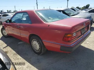 1990 Mercedes-Benz 300 CE with VIN WDBEA51D7LB137591, listed as a Copart auction lot 49811234 with 23,385 mi miles and Salvage Title. Bid and sale history available at carsss.com. Image 2.