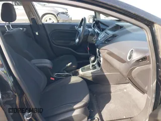 2016 Ford Fiesta SE with VIN 3FADP4EJ5GM153945, listed as a IAAI auction lot 41829241 with 157,597 mi miles. Bid and sale history available at carsss.com. Image 5.