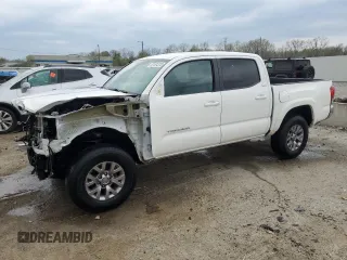 2018 Toyota Tacoma SR5 с VIN 5TFAZ5CN2JX065021, выставлен на аукционе Copart как лот 52151375 с пробегом 94 950 миль миль и Списание • Salvage title. История ставок и продаж доступна на DreamBid. Изображение 1.