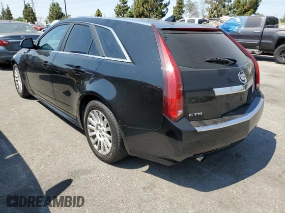 2012 Cadillac CTS with VIN 1G6DF8E50C0112985, listed as a Copart auction lot 64848474 with 167,850 mi miles and Salvage Title. Bid and sale history available at DreamBid. Image 2.