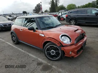 2013 MINI Hardtop S with VIN WMWSV3C57DT477948, listed as a Copart auction lot 54437155 with 63,114 mi miles and Salvage Title. Bid and sale history available at DreamBid. Image 4.