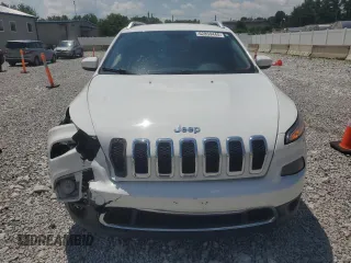 2014 Jeep Cherokee Limited z VIN 1C4PJLDS2EW261465, wystawiony jako Copart lot #62859445 z przebiegiem Nie podano mil oraz Szkoda całkowita • Salvage title. Historia ofert i sprzedaży dostępna na DreamBid. Obrazek 5.