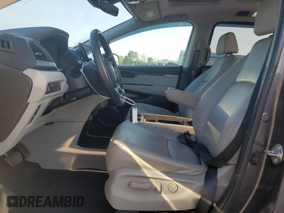 2018 Honda Odyssey Touring с VIN 5FNRL6H83JB009998, выставлен на аукционе Copart как лот 60616695 с пробегом 101 880 миль миль и Списание • Salvage title. История ставок и продаж доступна на DreamBid. Изображение 7.