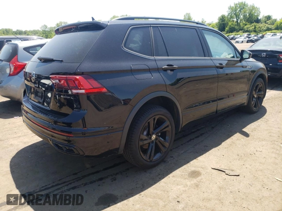 2023 Volkswagen Tiguan SE R-Line Black with VIN 3VV8B7AX2PM121851, listed as a Copart auction lot 59206135 with 23,723 mi miles and Salvage title. Bid and sale history available at DreamBid. Image 3.