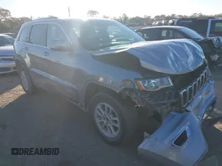 2018 Jeep Grand Cherokee Laredo E with VIN 1C4RJEAG2JC451329, listed as a IAAI auction lot 41303496 with 103,603 mi miles and . Bid and sale history available at DreamBid. Image 1.