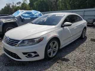 2015 Volkswagen CC Sport z VIN WVWBN7AN5FE821507, wystawiony jako Copart lot #60193295 z przebiegiem 145 085 mil mil oraz Nie do naprawy • Non repairable. Historia ofert i sprzedaży dostępna na DreamBid. Obrazek 1.