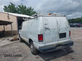 2012 Ford Econoline Cargo Commercial with VIN 1FTNE1EW9CDA86738, listed as a IAAI auction lot 42464315 with 180,322 mi miles and . Bid and sale history available at DreamBid. Image 3.