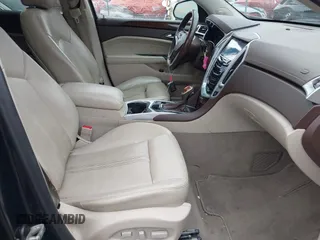 2013 Cadillac SRX Performance Collection z VIN 3GYFNHE39DS642111, wystawiony jako IAAI lot #42470291 z przebiegiem 176 239 mil mil oraz . Historia ofert i sprzedaży dostępna na DreamBid. Obrazek 5.