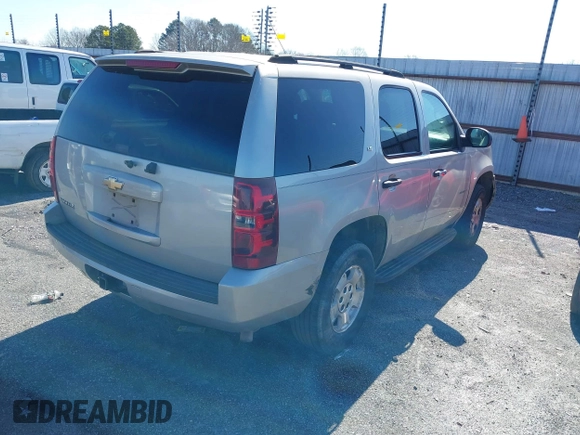 2007 Chevrolet Tahoe LTZ with VIN 1GNFC13JX7R149914, listed as a IAAI auction lot 41497405 with 264,932 mi miles and . Bid and sale history available at DreamBid. Image 4.