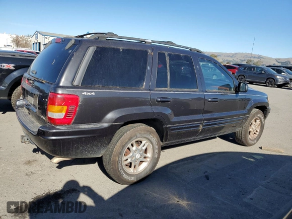 1999 Jeep Grand Cherokee Limited with VIN 1J4GW68N9XC743436, listed as a Copart auction lot 86803524 with 129,204 mi miles and Clean Title. Bid and sale history available at carsss.com. Image 3.