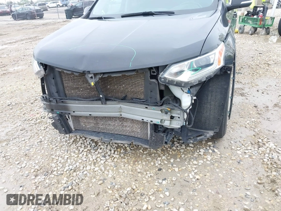 2021 Chevrolet Traverse LT with VIN 1GNERHKW0MJ218426, listed as a IAAI auction lot 42178273 with 76,545 mi miles and . Bid and sale history available at DreamBid. Image 6.