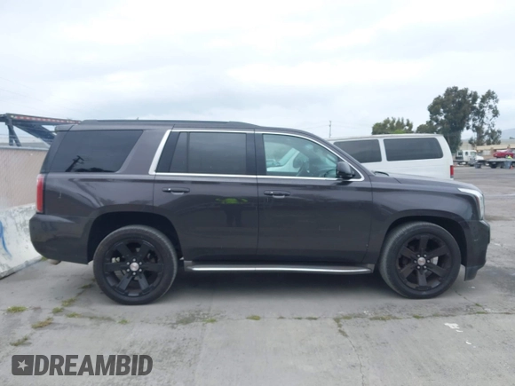 2015 GMC Yukon SLT with VIN 1GKS1BKC6FR245564, listed as a IAAI auction lot 42139295 with 149,088 mi miles. Bid and sale history available at carsss.com. Image 13.