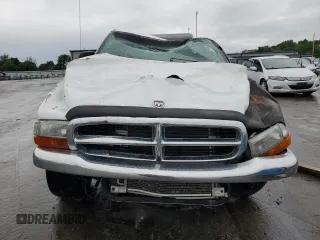 2000 Dodge Dakota Sport z VIN 1B7GL2AX7YS640249, wystawiony jako Copart lot #55989395 z przebiegiem Nie podano mil oraz Nie do naprawy • Non repairable. Historia ofert i sprzedaży dostępna na DreamBid. Obrazek 5.