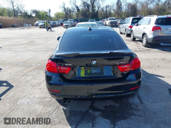 2016 BMW 4 Series 428i xDrive with VIN WBA4C9C53GG135945, listed as a IAAI auction lot 41964691 with 93,273 mi miles and . Bid and sale history available at carsss.com. Image 16.