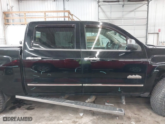 2015 Chevrolet Silverado 1500 High Country with VIN 3GCUKTEJXFG290752, listed as a IAAI auction lot 41412988 with 160,000 mi miles. Bid and sale history available at carsss.com. Image 14.