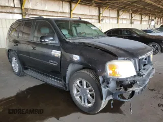 2006 GMC Envoy Denali with VIN 1GKES63M662302685, listed as a Copart auction lot 74315054 with 80,134 mi miles and Salvage Title. Bid and sale history available at carsss.com. Image 4.