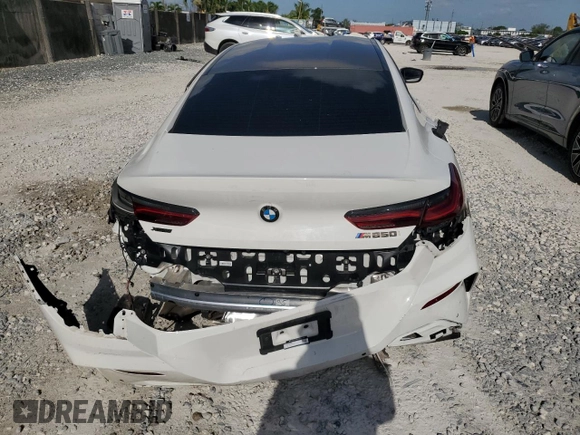 2020 BMW 8 Series M850i with VIN WBAGV8C05LCE22486, listed as a Copart auction lot 66358114 with 50,439 mi miles and Non Repairable. Bid and sale history available at carsss.com. Image 6.
